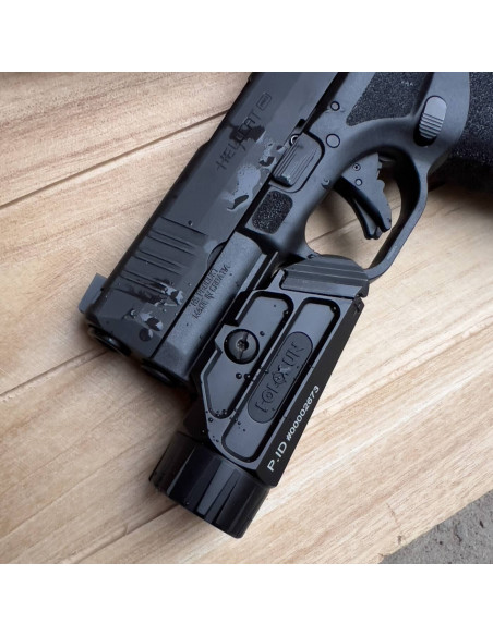 Holosun P.ID 1000 lumen tactical rechargeable weapon flashlight mounted on a pistol